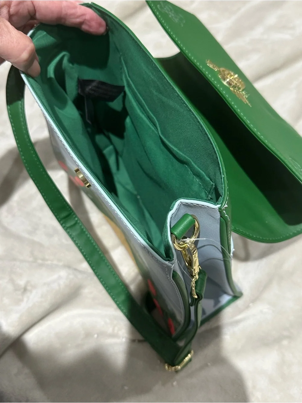 Green Illustrated Crossbody Bag with Gold Emblem